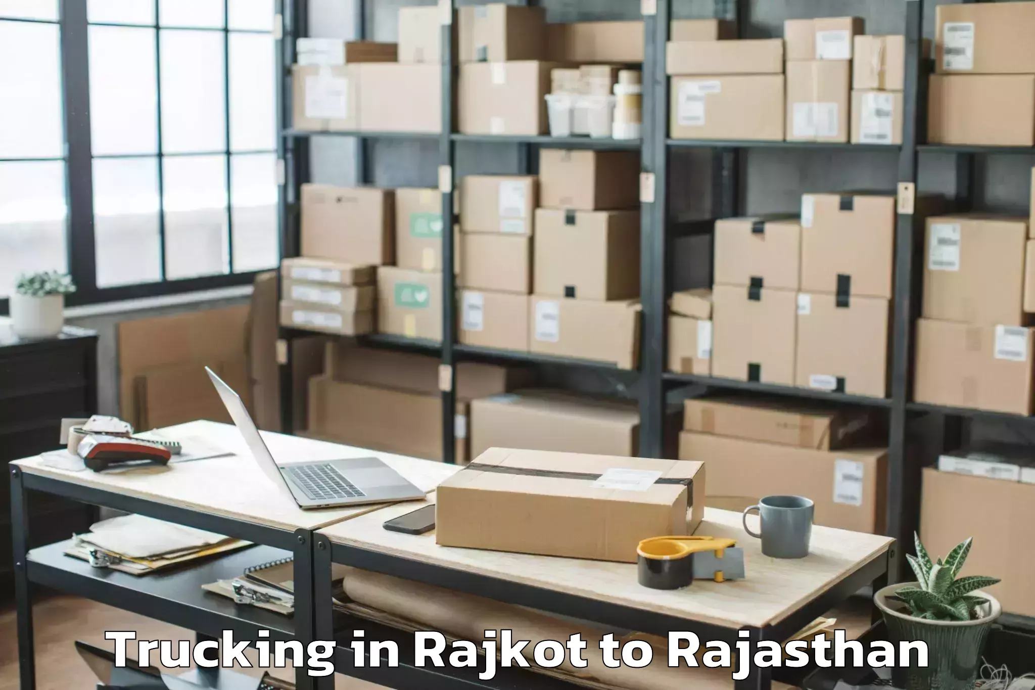 Leading Rajkot to Bari Dholpur Trucking Provider